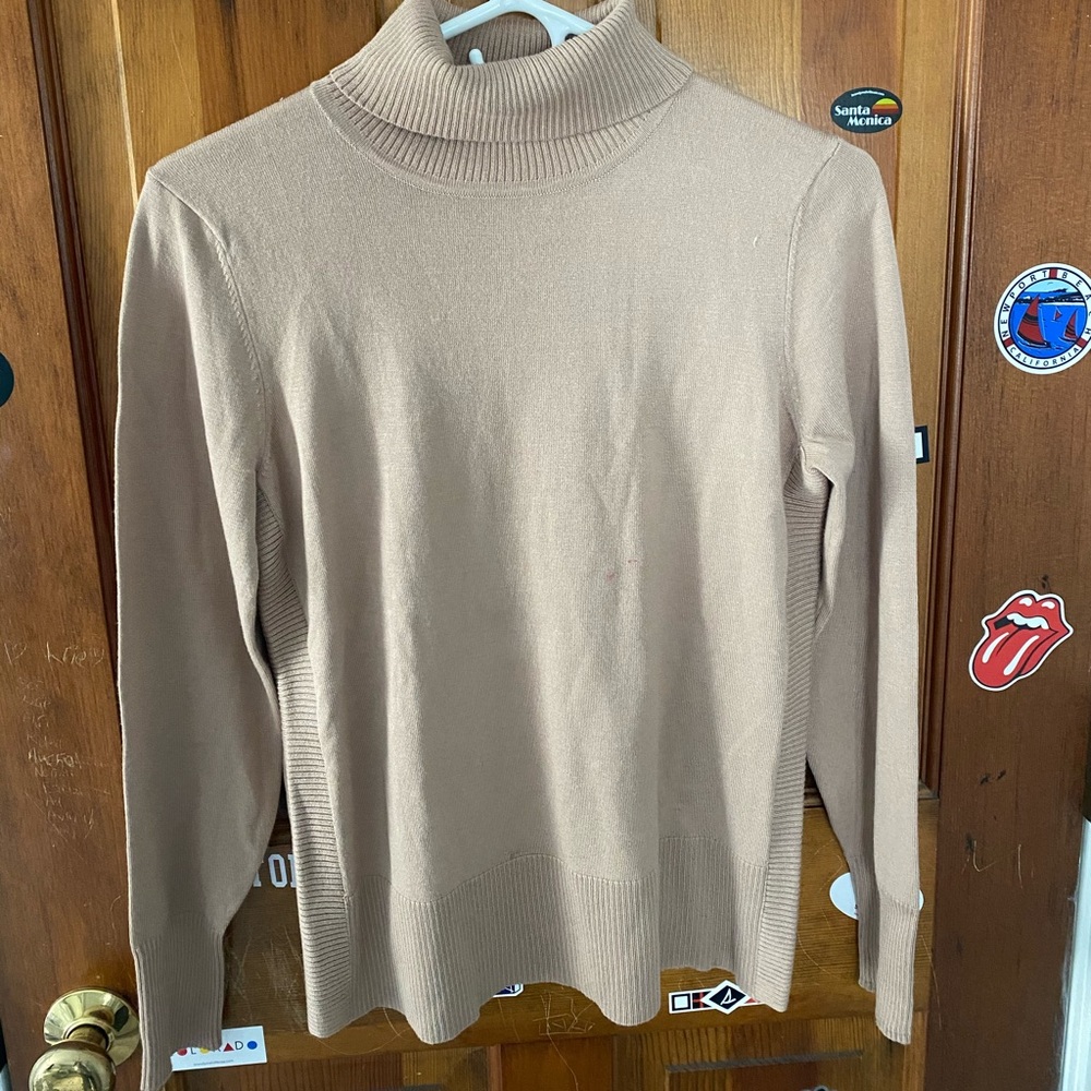 Woman’s Cable and Gauge Sweater